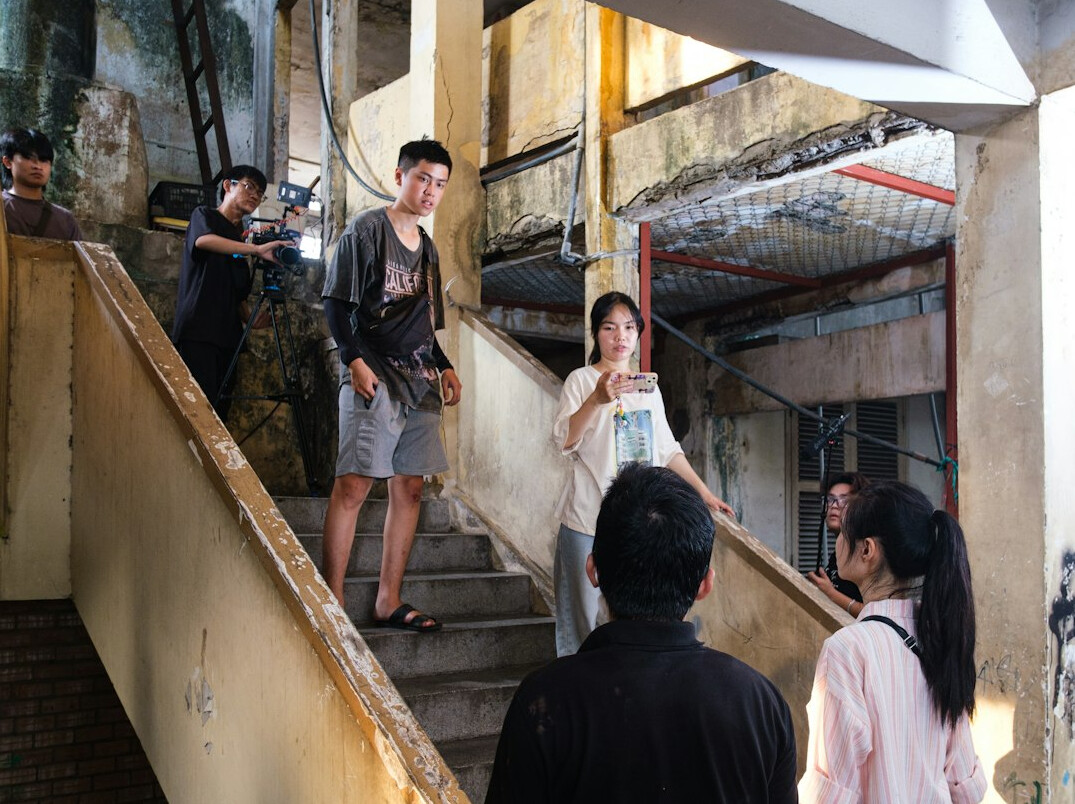 Behind the scenes of a documentary film shoot with camera crew