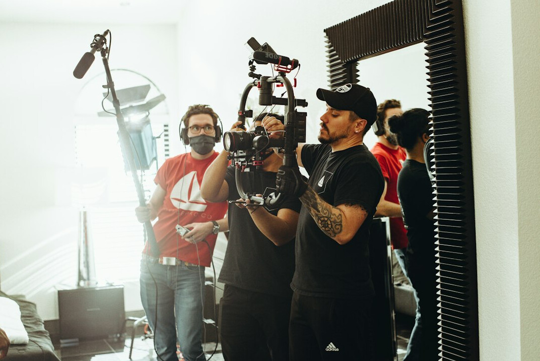 filmmaker recording sound on set